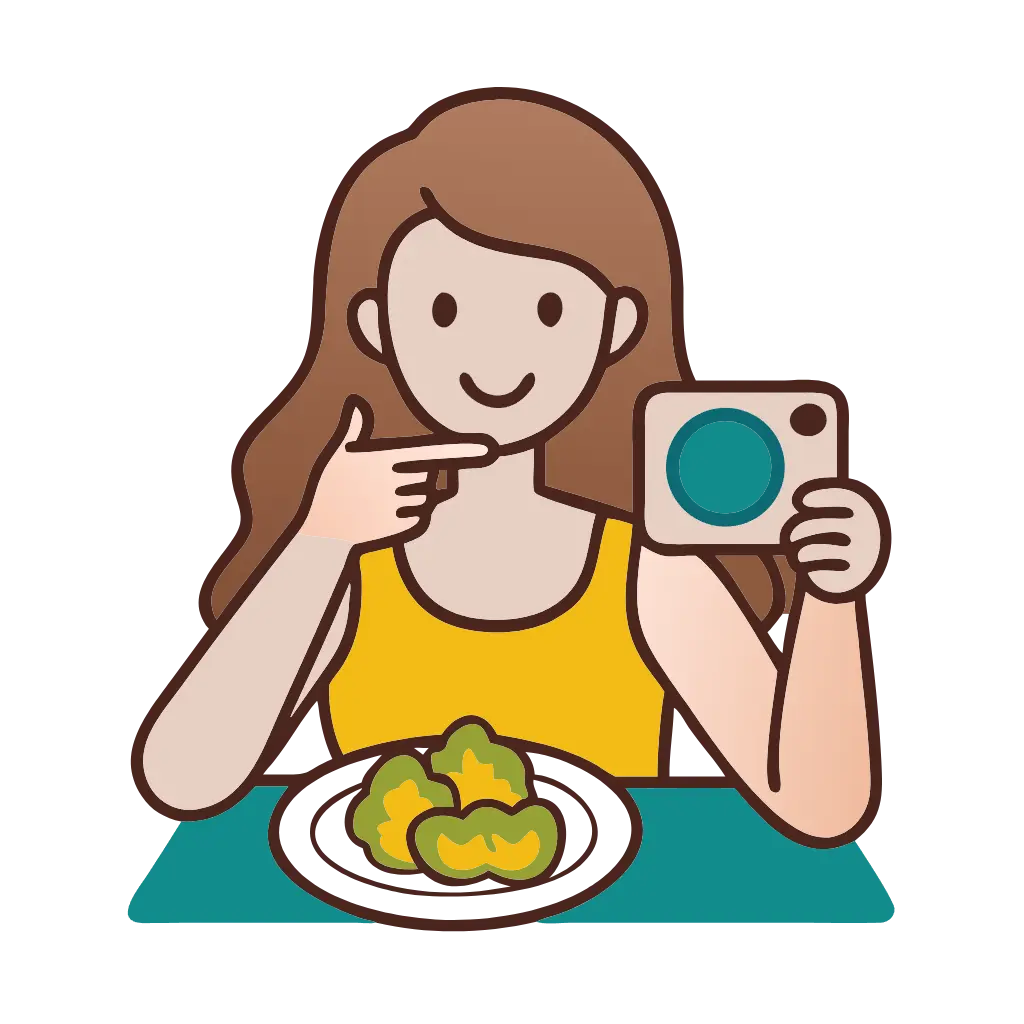 Woman taking a photo of her meal